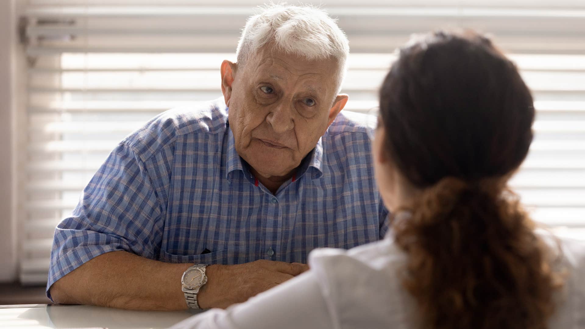 Man who's selfless to a fault talking to his adult daughter.