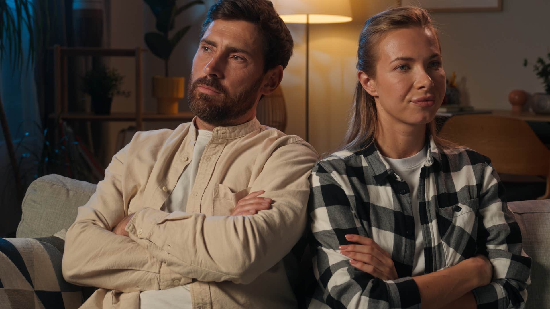 Couple not laughing together anymore at home.