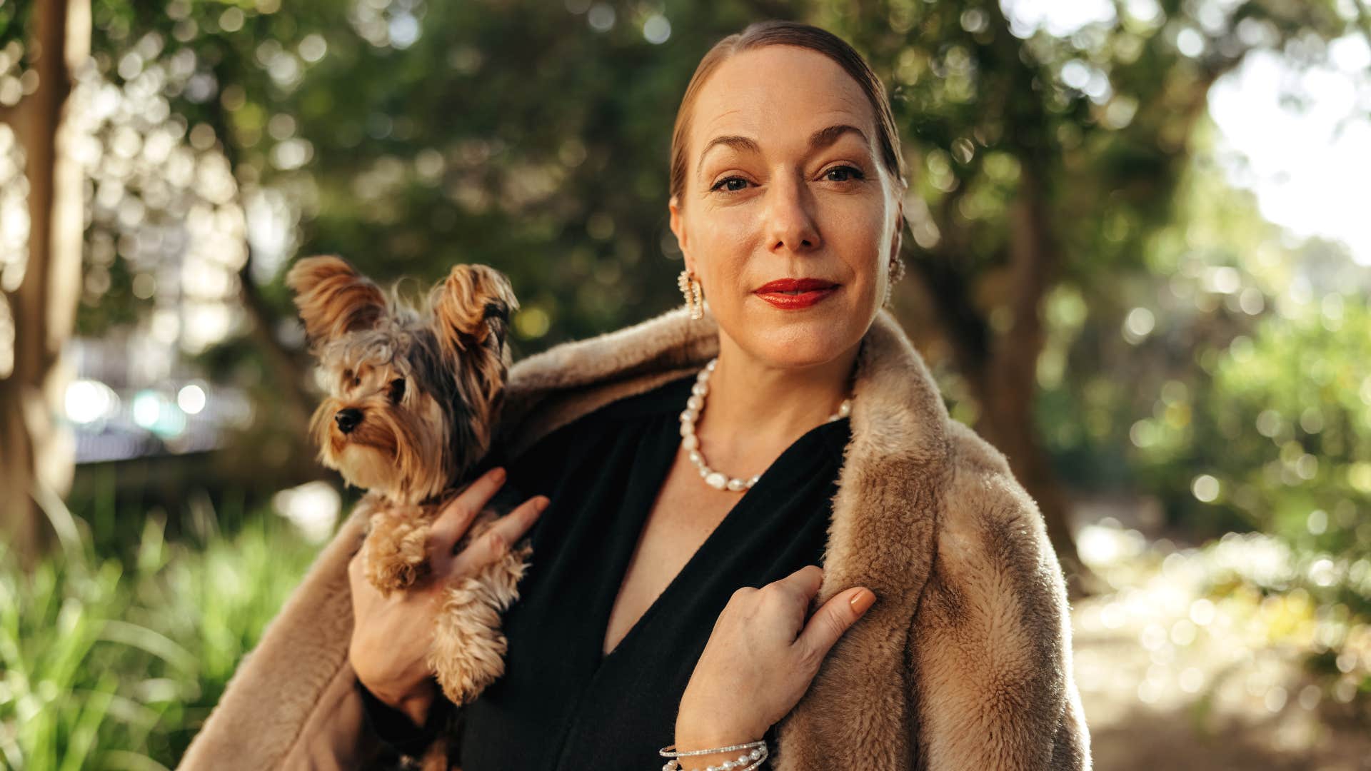 rich looking woman feeling high status