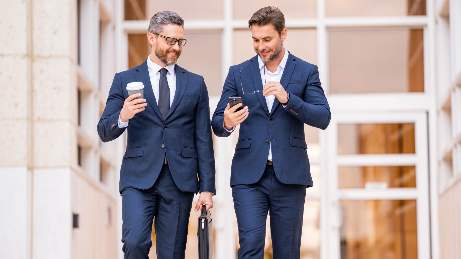 man who lacks class name dropping to colleague