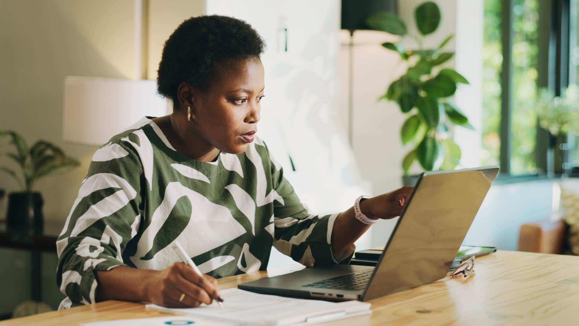 deep thinking woman working at home