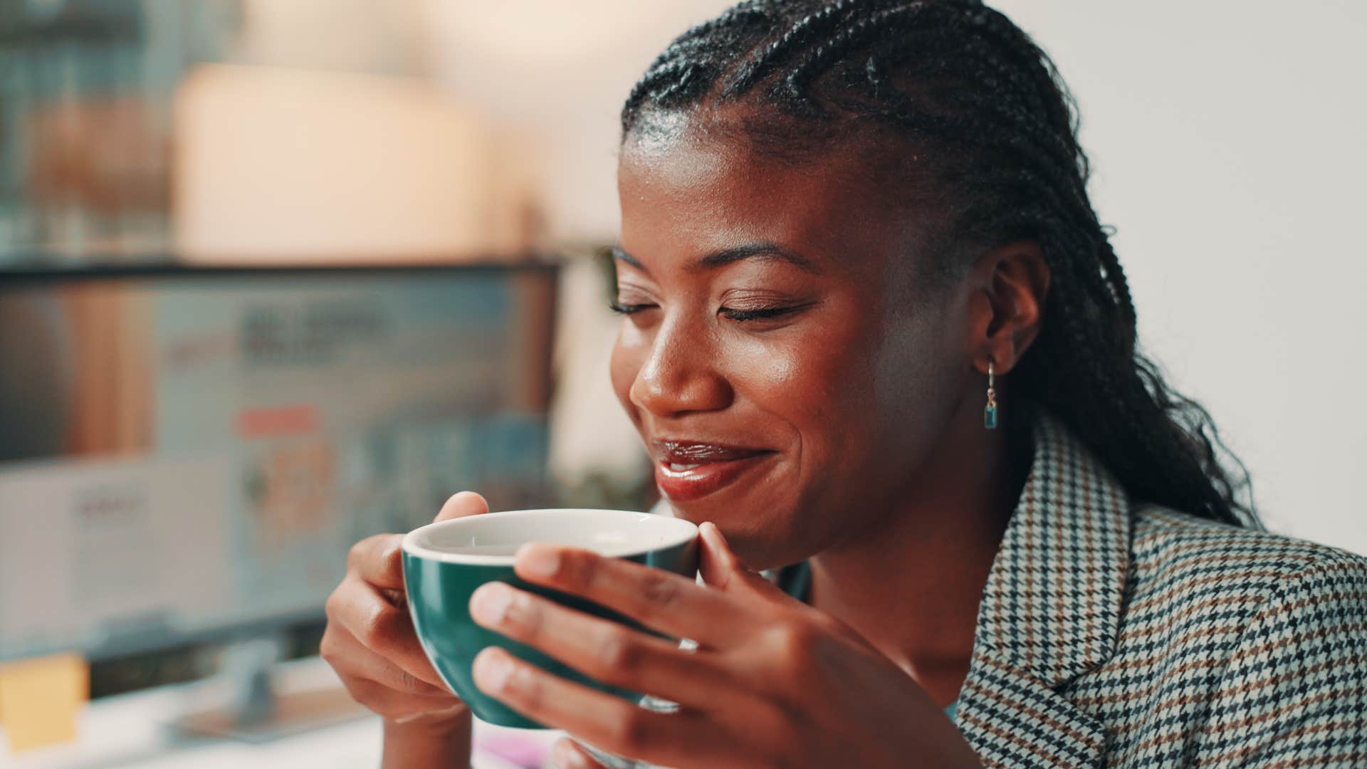 emotionally intelligent and regulated woman drinking tea