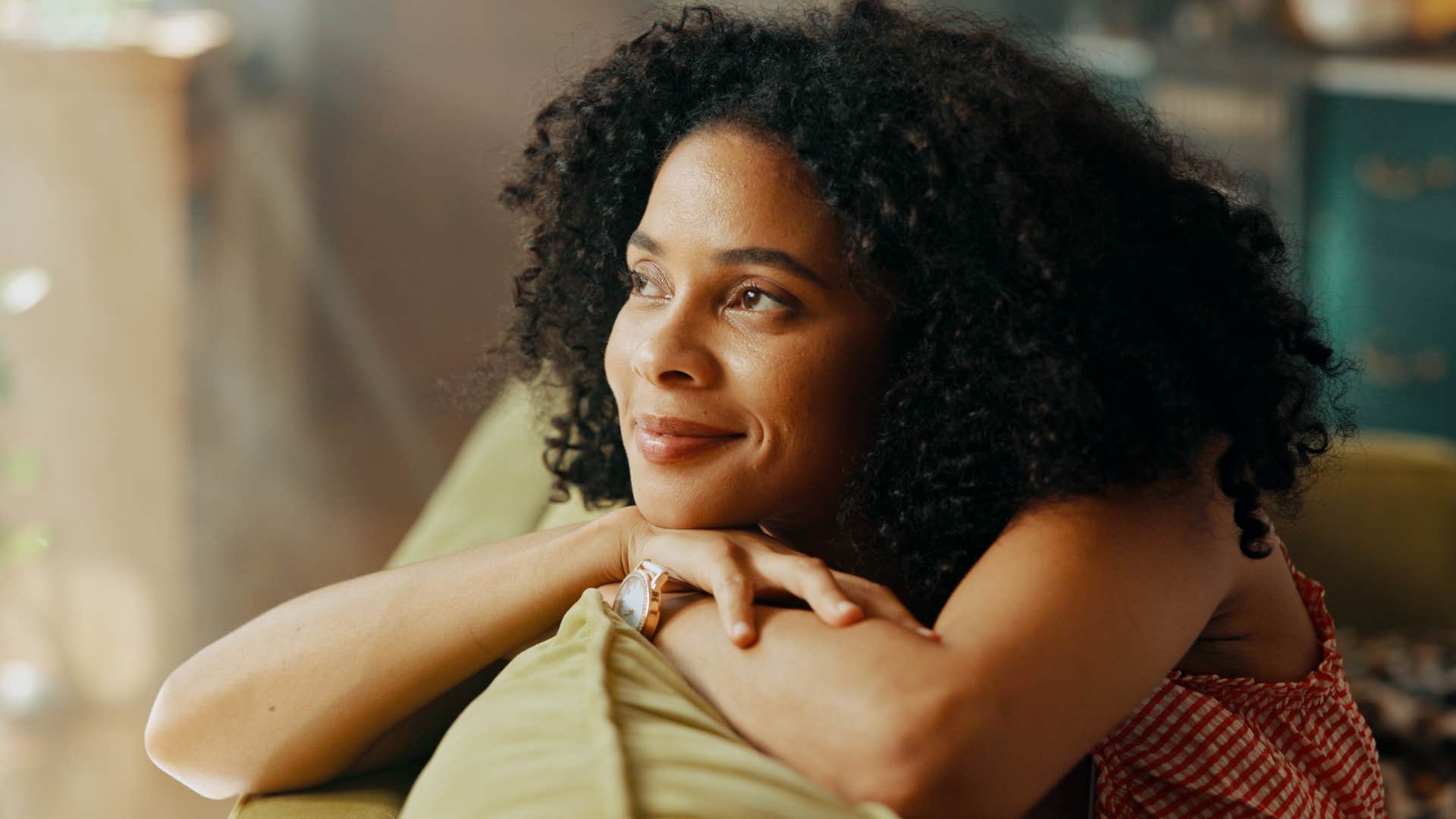 woman with strong boundaries smiling at home