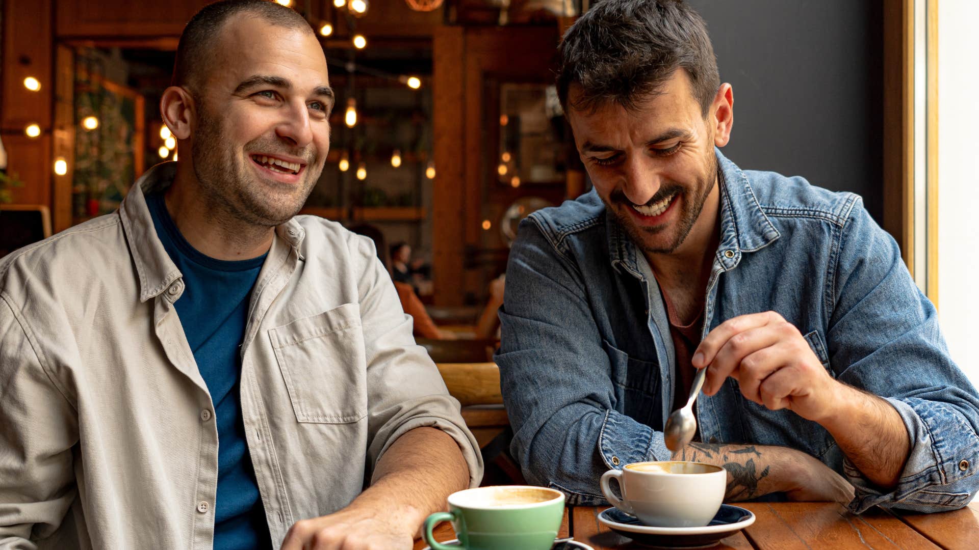 two men having coffee together