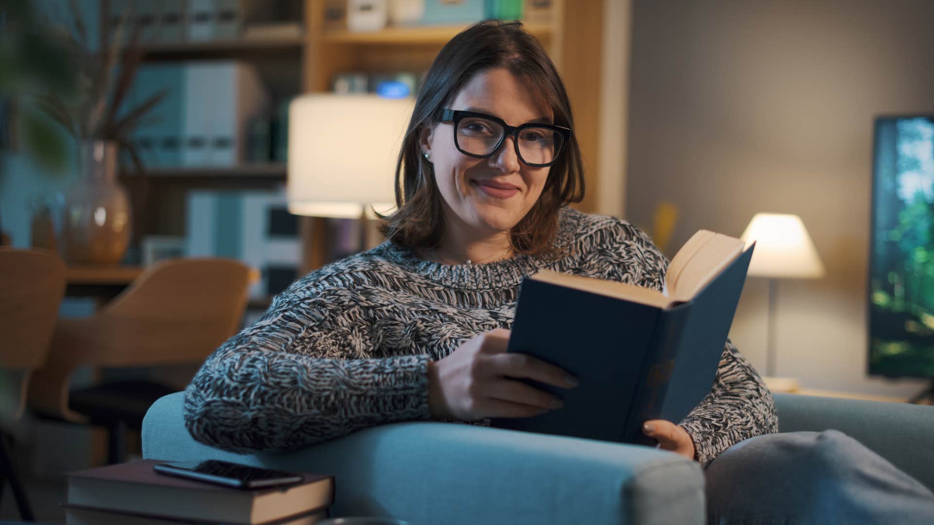 woman reading in private at home