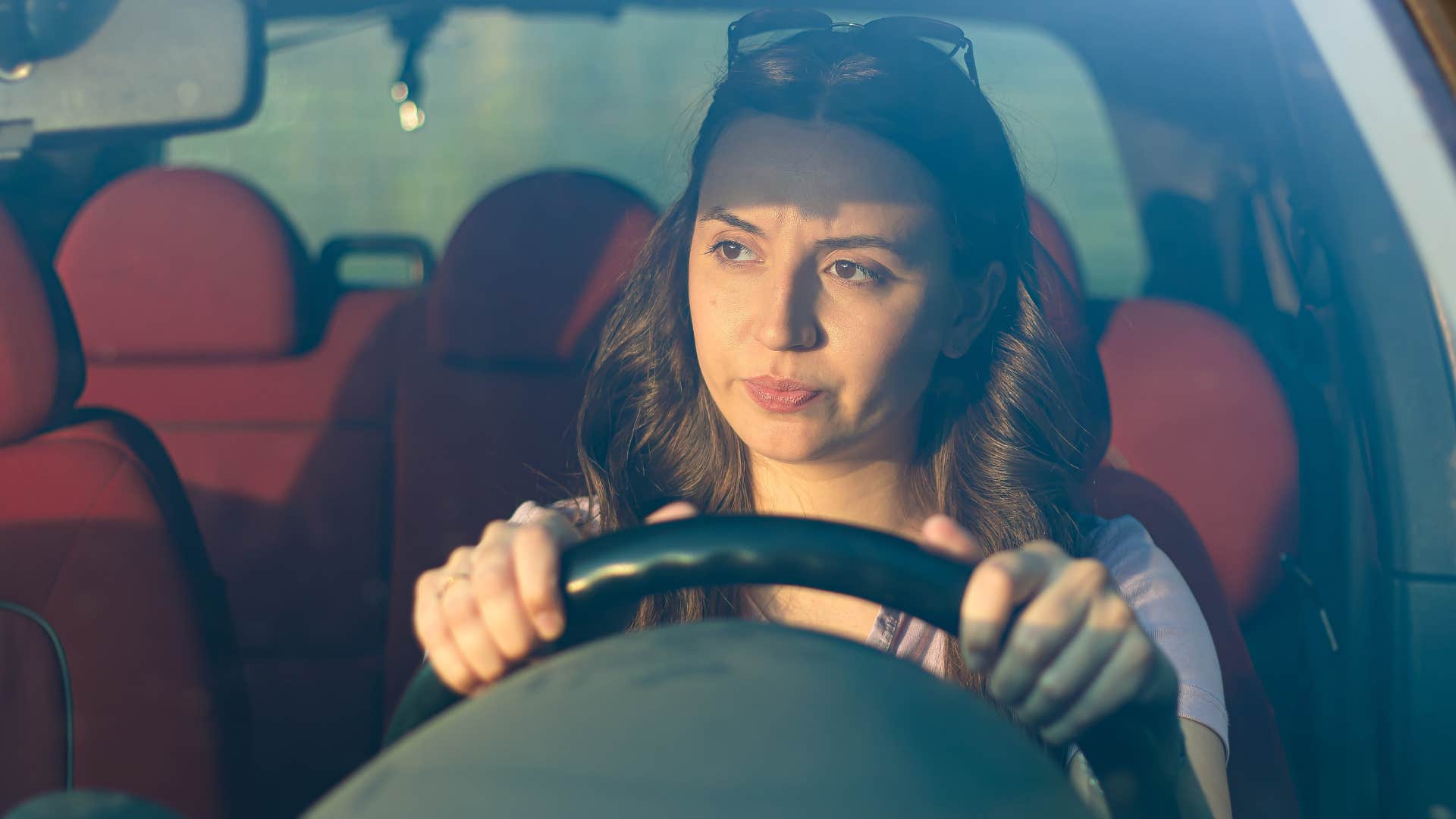 woman who lives in her own bubble driving her car