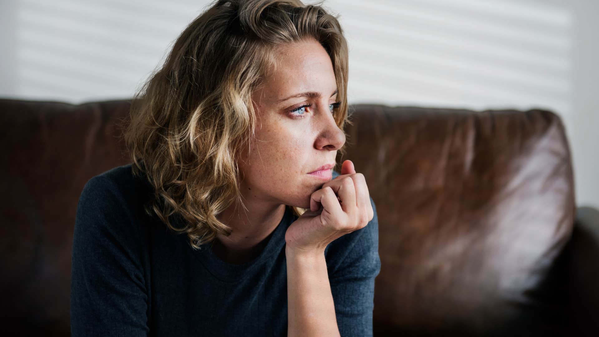 sad woman saying things can be so good about her loveless marriage
