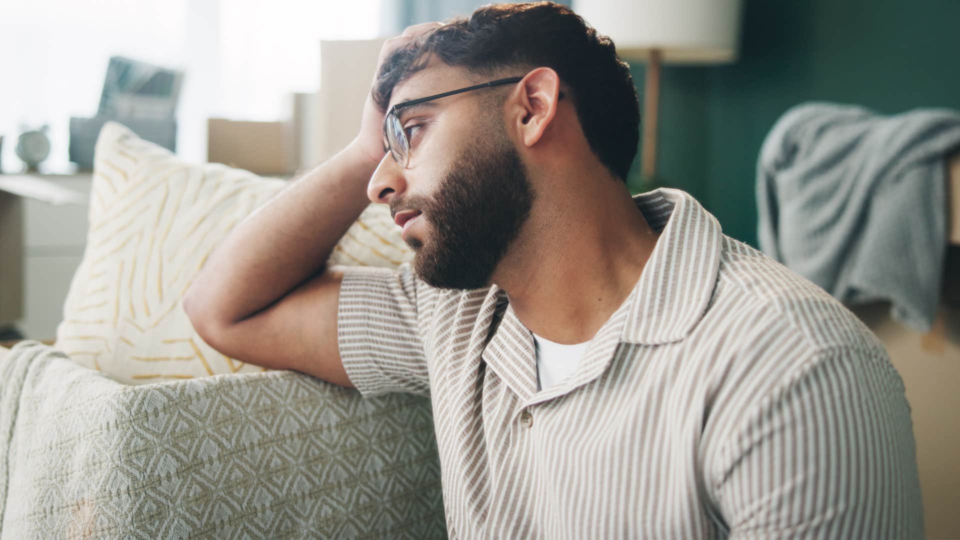 sad man thinking his relationship is worth fighting for
