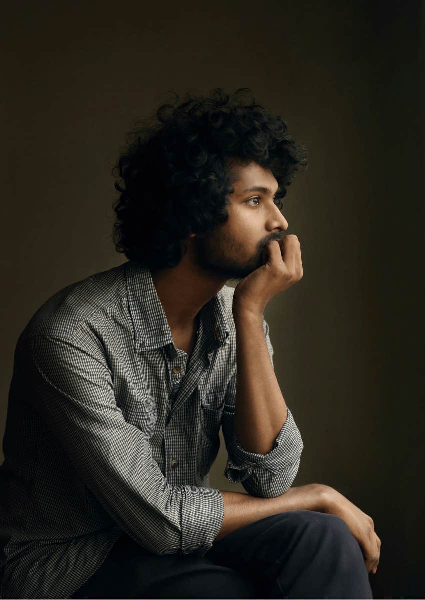 thoughtful man ruminating instead of acting