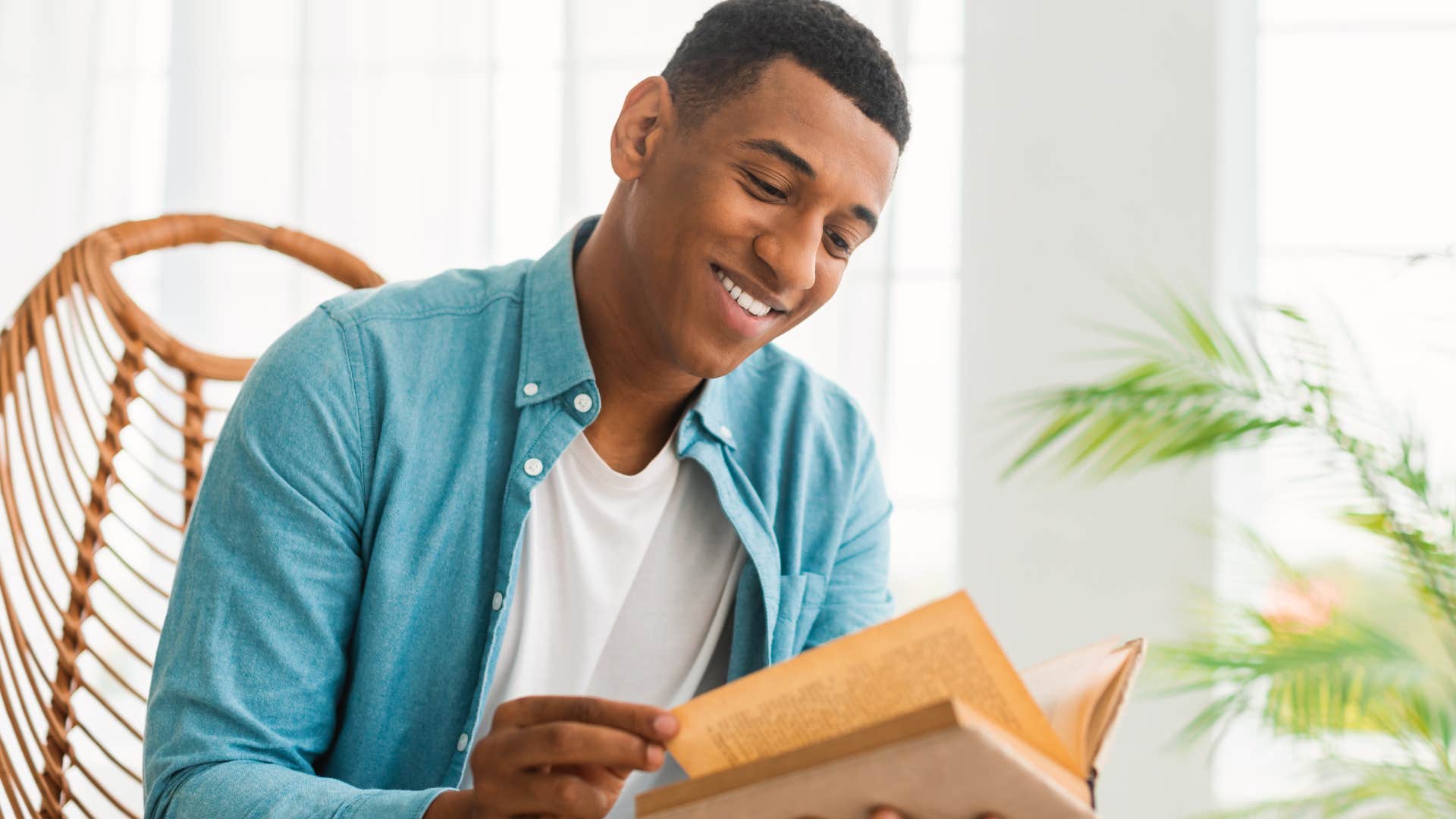 poetic and romantic people who still read physical books instead of scrolling usually have these rare personality traits poetic and romantic man reading and smiling