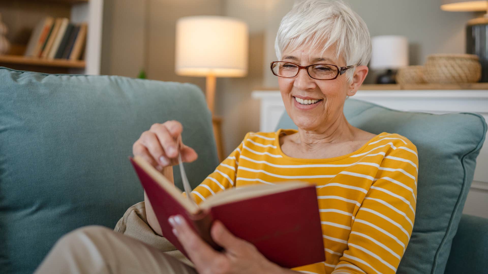 reflective rather than reactive people who still read physical books instead of scrolling usually have these rare personality traits woman reflecting while reading