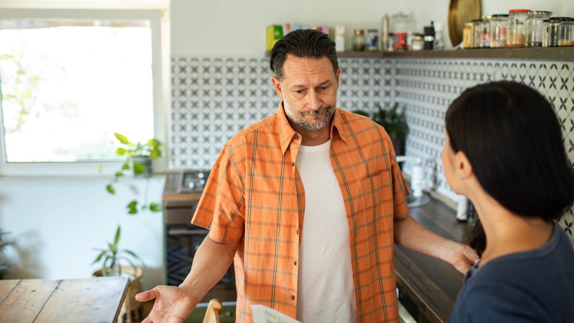 Man saying "I literally never said that" to his wife.