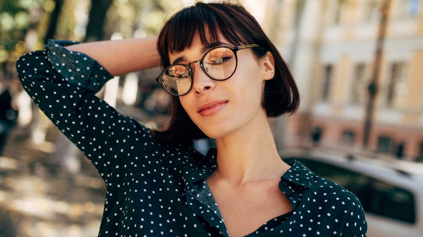 rare and intimidating woman posing outside