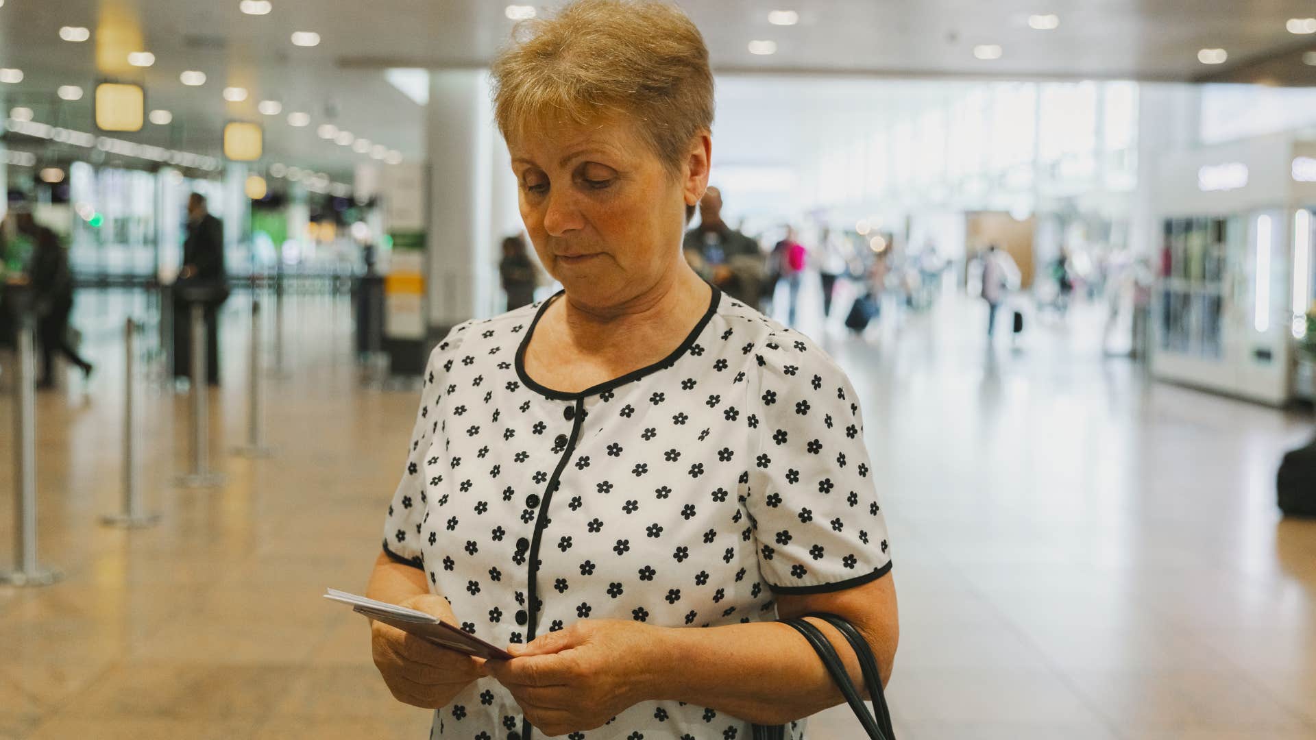 impatient woman who hates waiting in lines standing in the airport