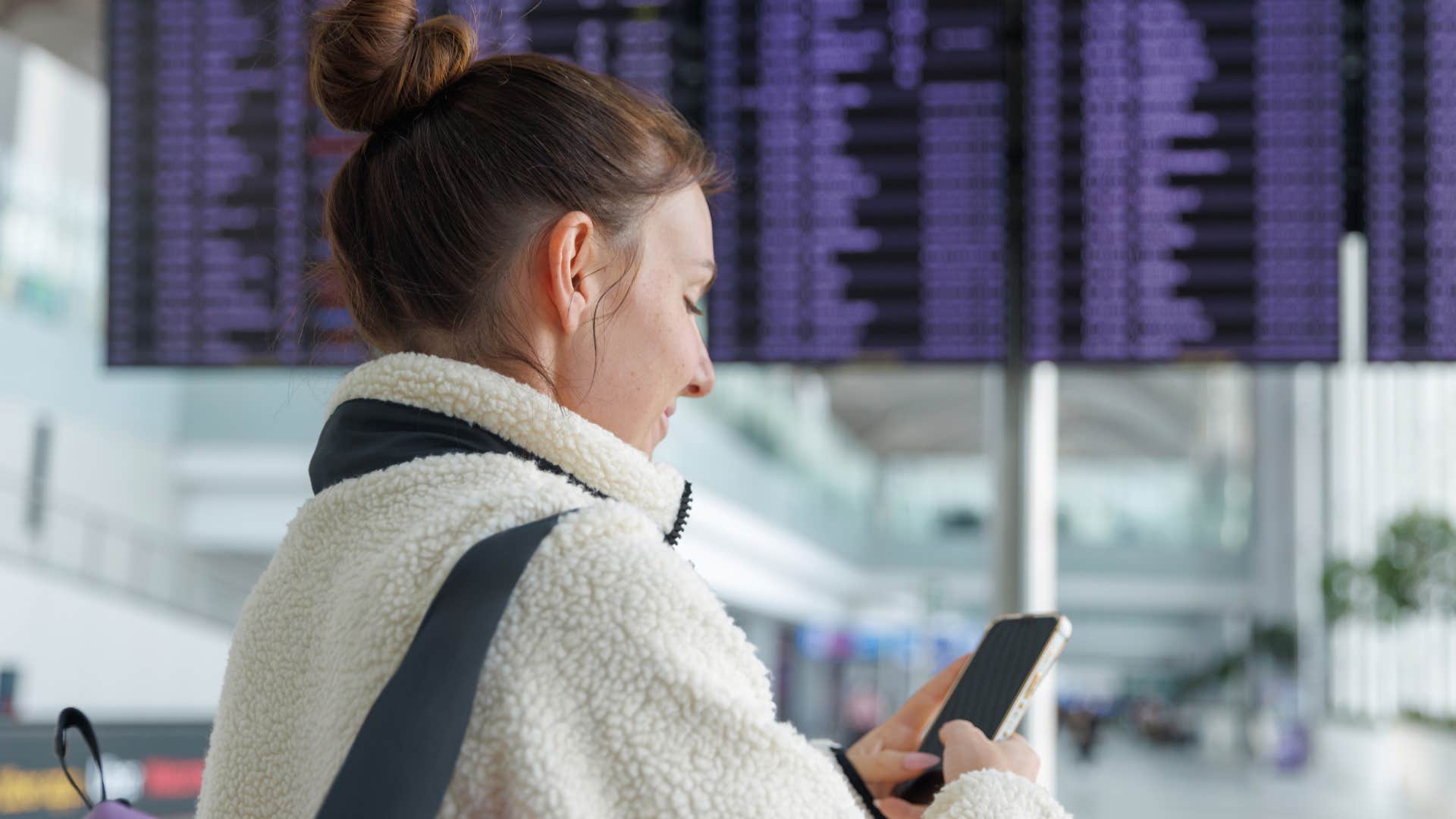 patient woman waiting in the airport to board