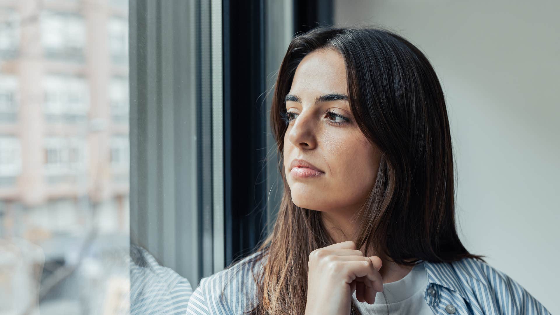 loner woman sitting at home