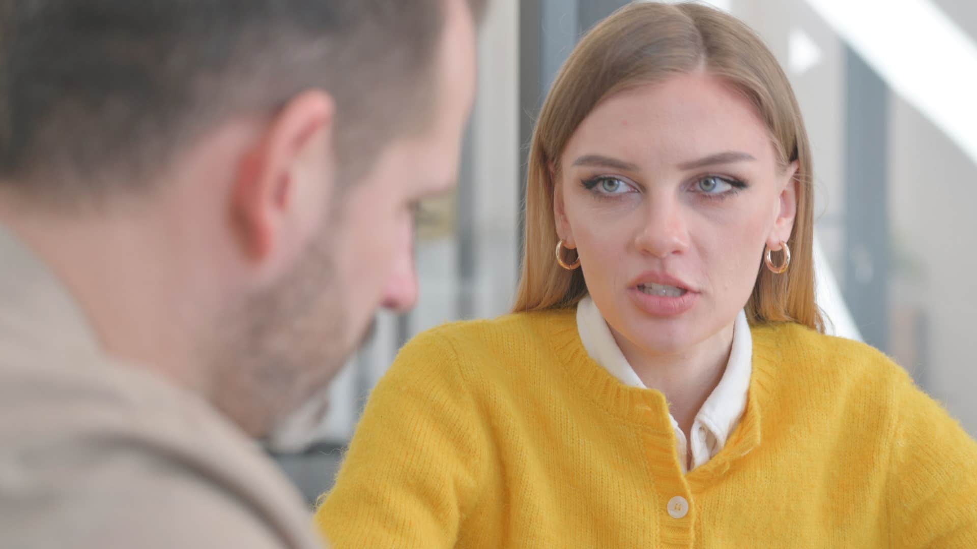 Man saying "you look so much better without all that makeup" to a woman.