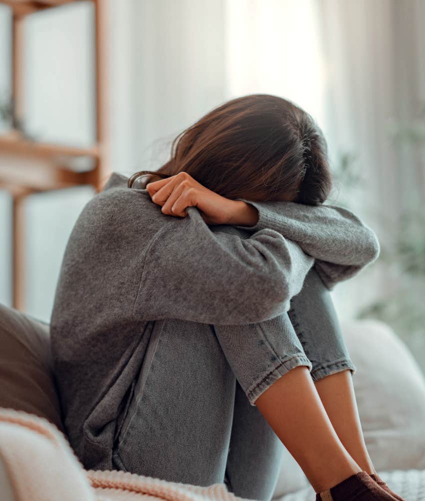 sad woman isolated from loved ones