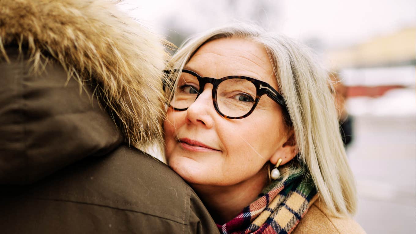 The Real Test of Love Is Who You’d Want Beside You When Your Parents Die Woman leaning on man for comfort, representing emotional connection, compassion, and true love during times of loss