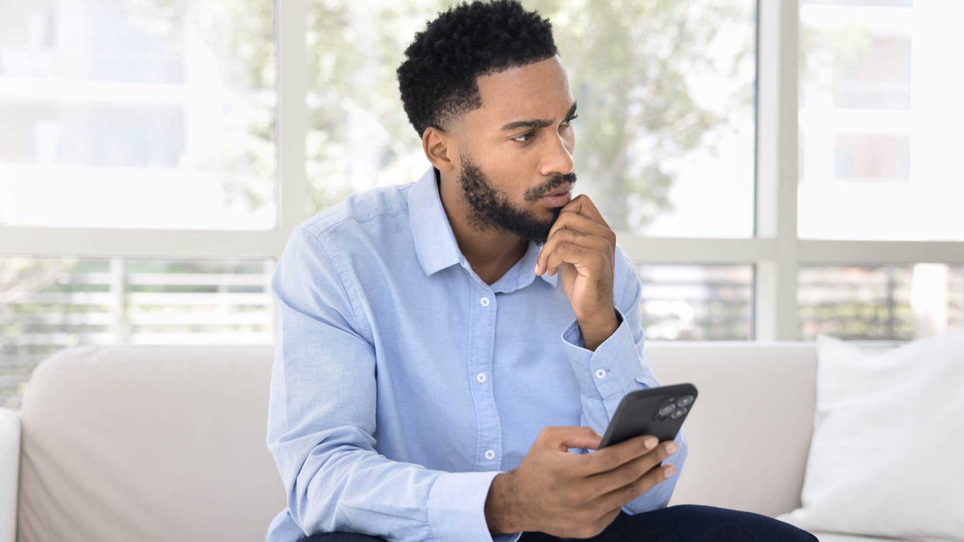 gen z man struggling with college debt