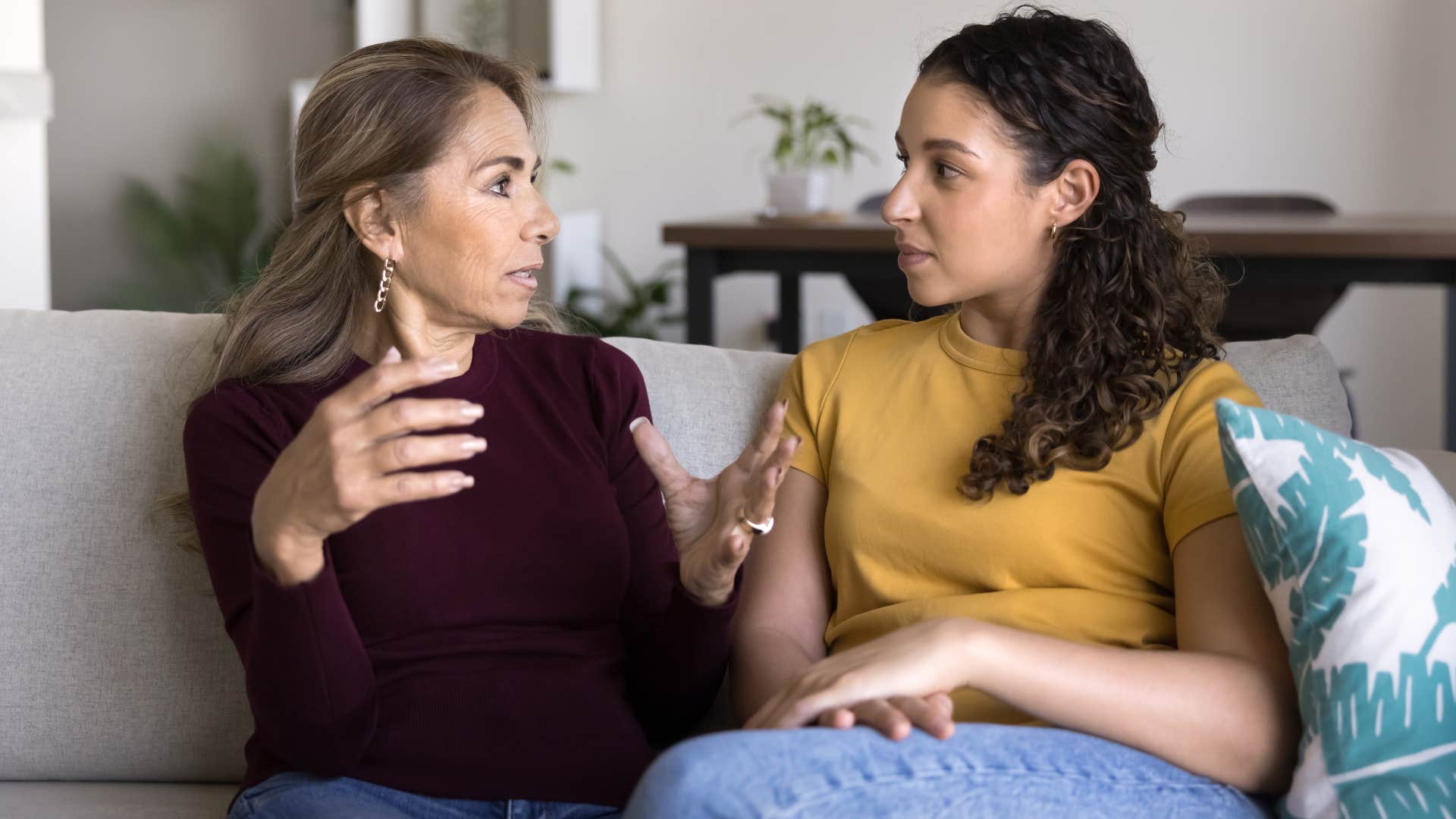 gen z woman talking to mom about not affording a home