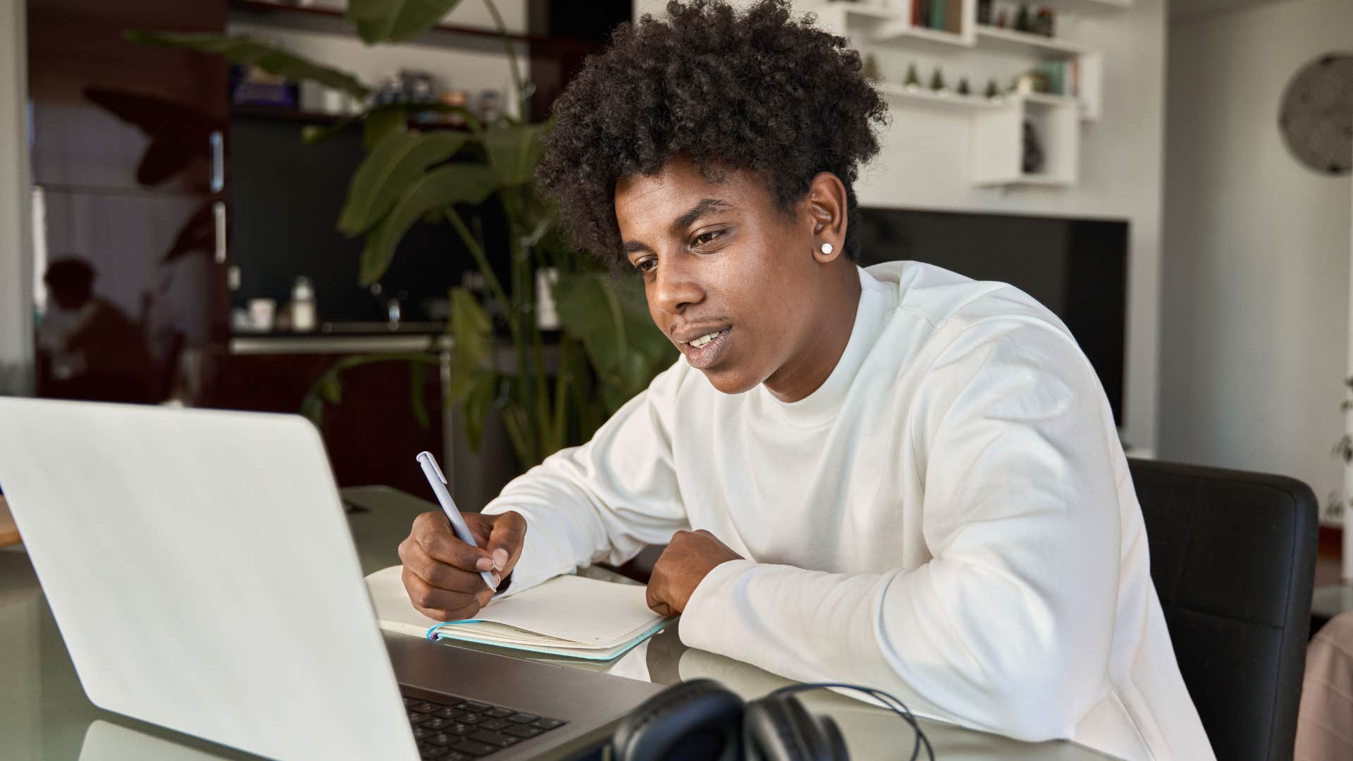 gen z man working full-time with little to show for it
