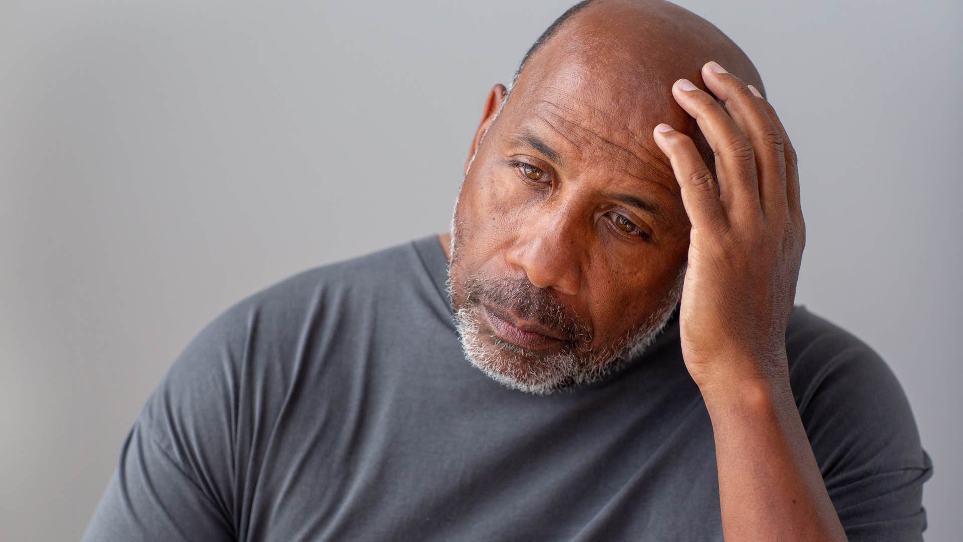 man who feels chronically misunderstood looking sad