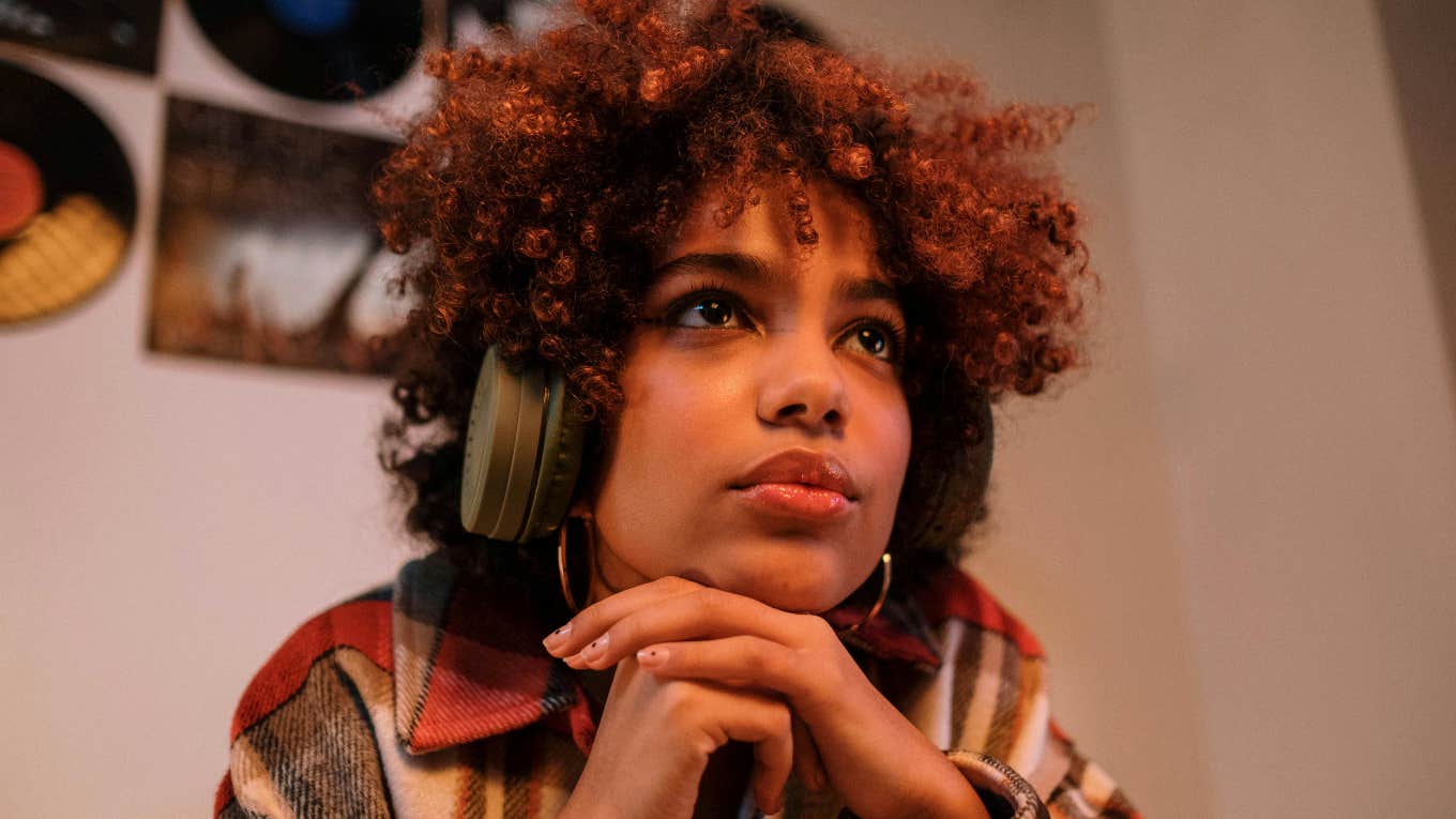 woman listening sad songs instead happy ones