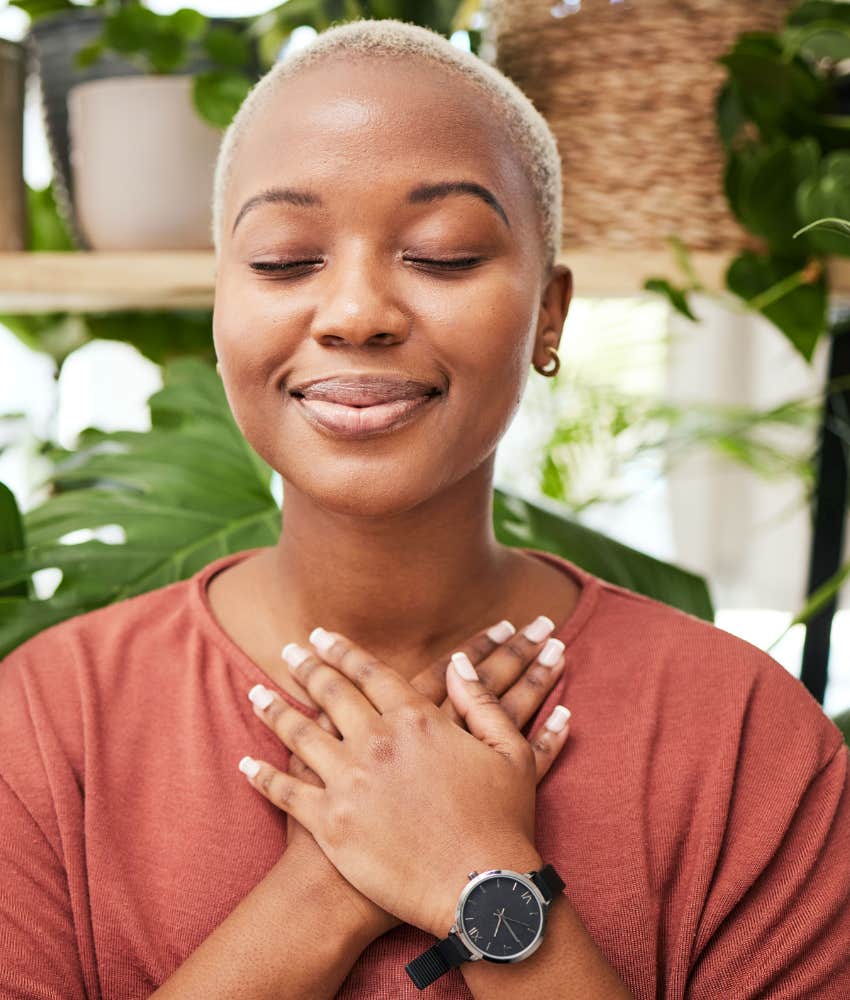 Enlightened woman connects with herself