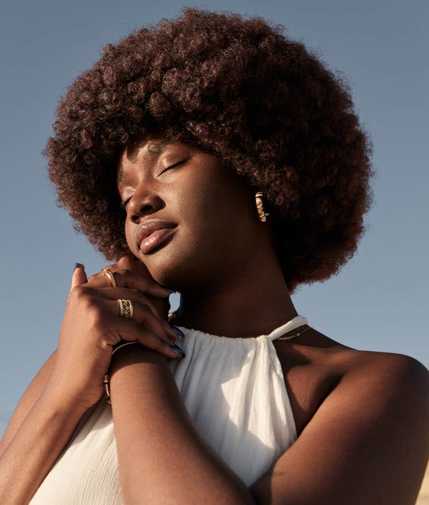 Spiritual woman guides herself to peace