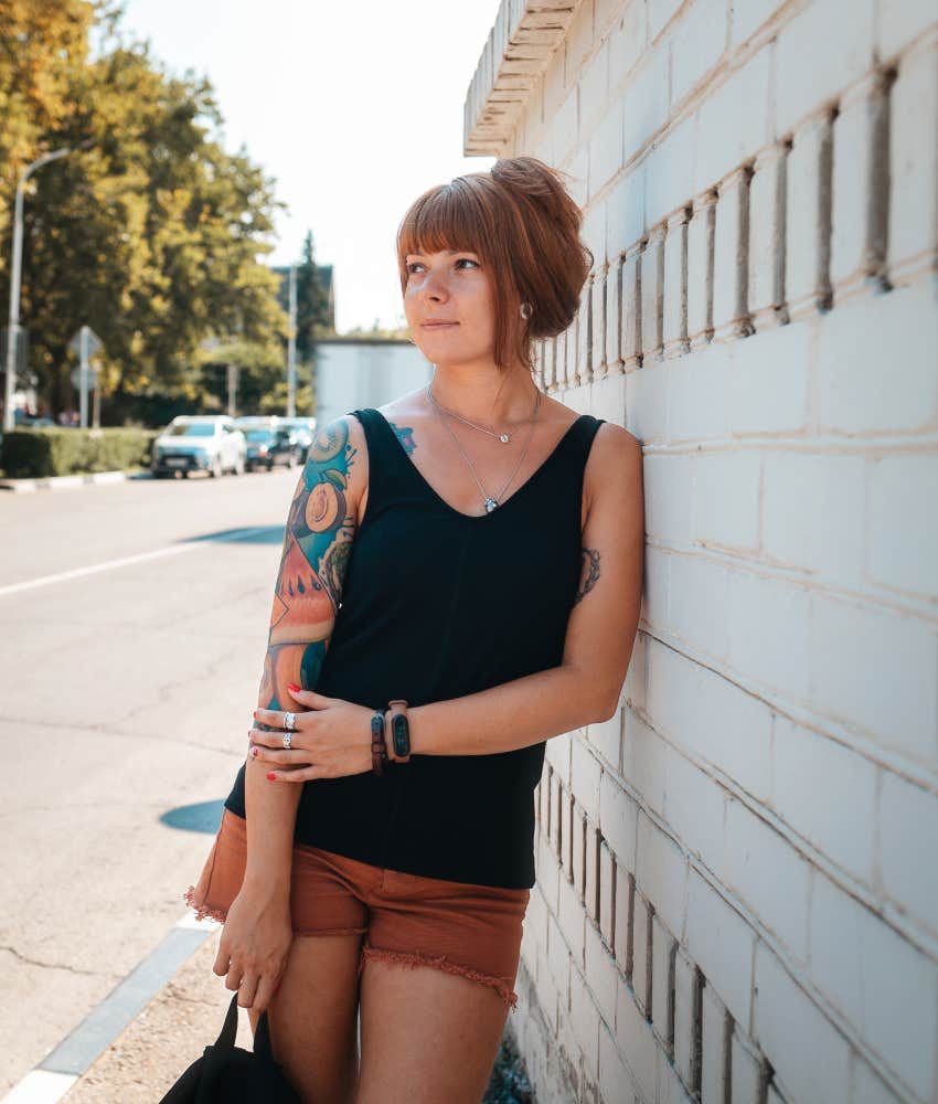 female tourist respecting tattoo culture while traveling