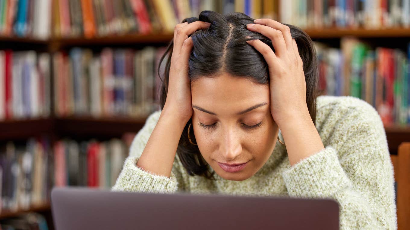 Science Says You're a Creative Genius If You're Annoyed By This One Thing woman distracted while working