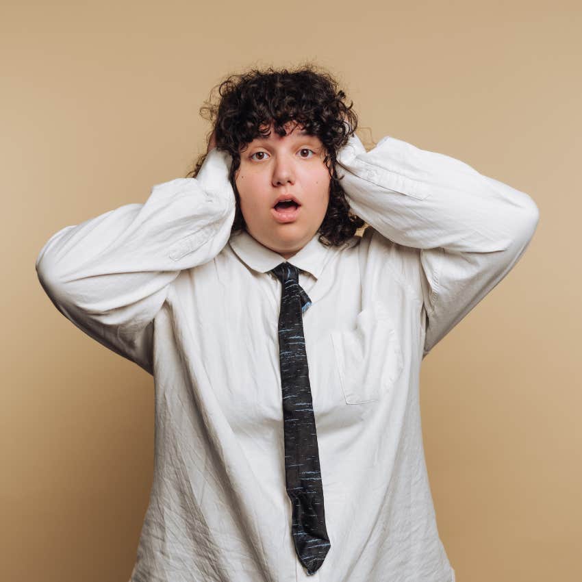 woman who is listening to sound she can't stand