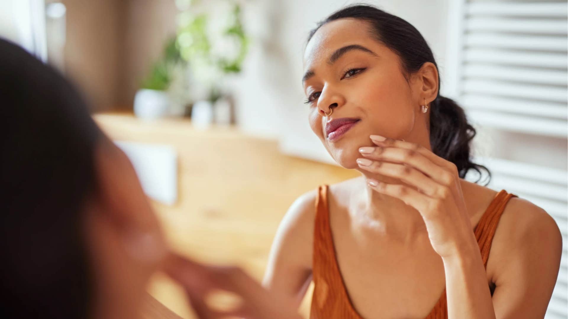 Woman using self-care to accept herself with better habits