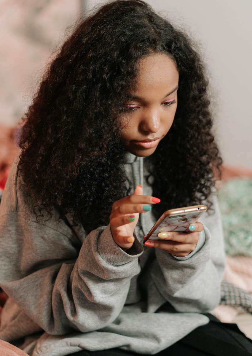 teen girl on her phone