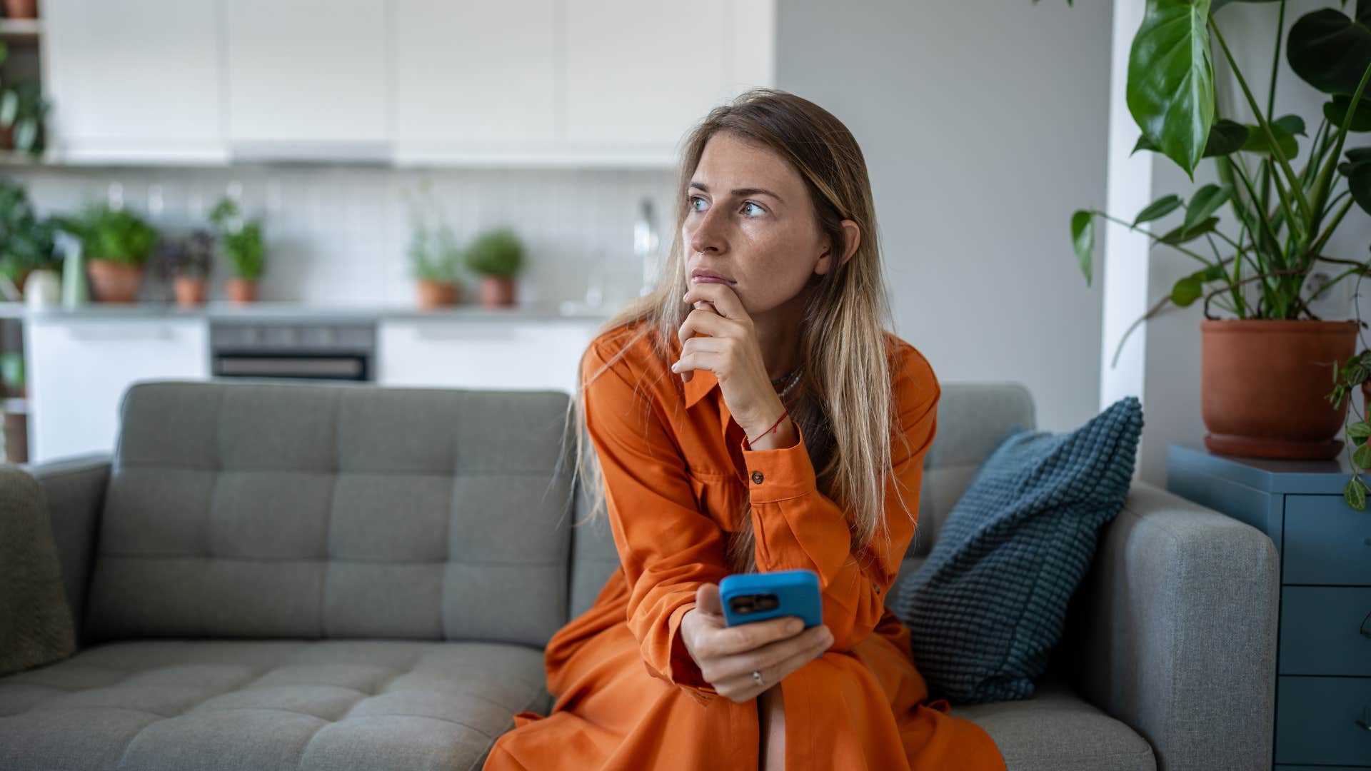 woman who needs to close chapter with ex as her mood is negatively affected when she doesn't hear from him