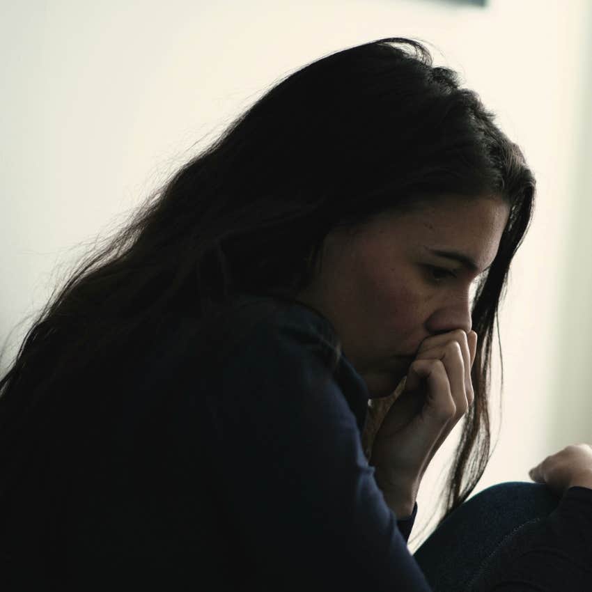 woman who has a cinderella complex as she is anxious going about it alone