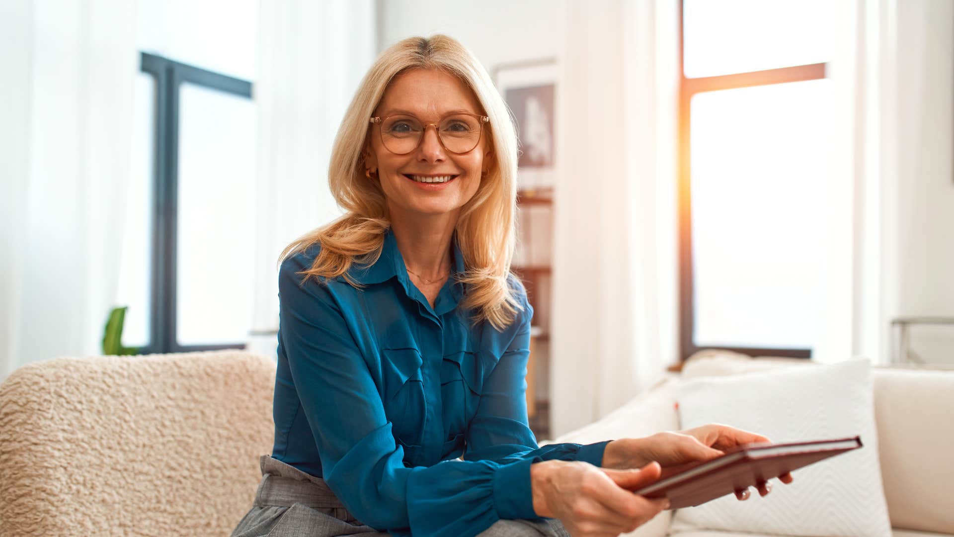 woman in blue and with glasses drawn to healing roles