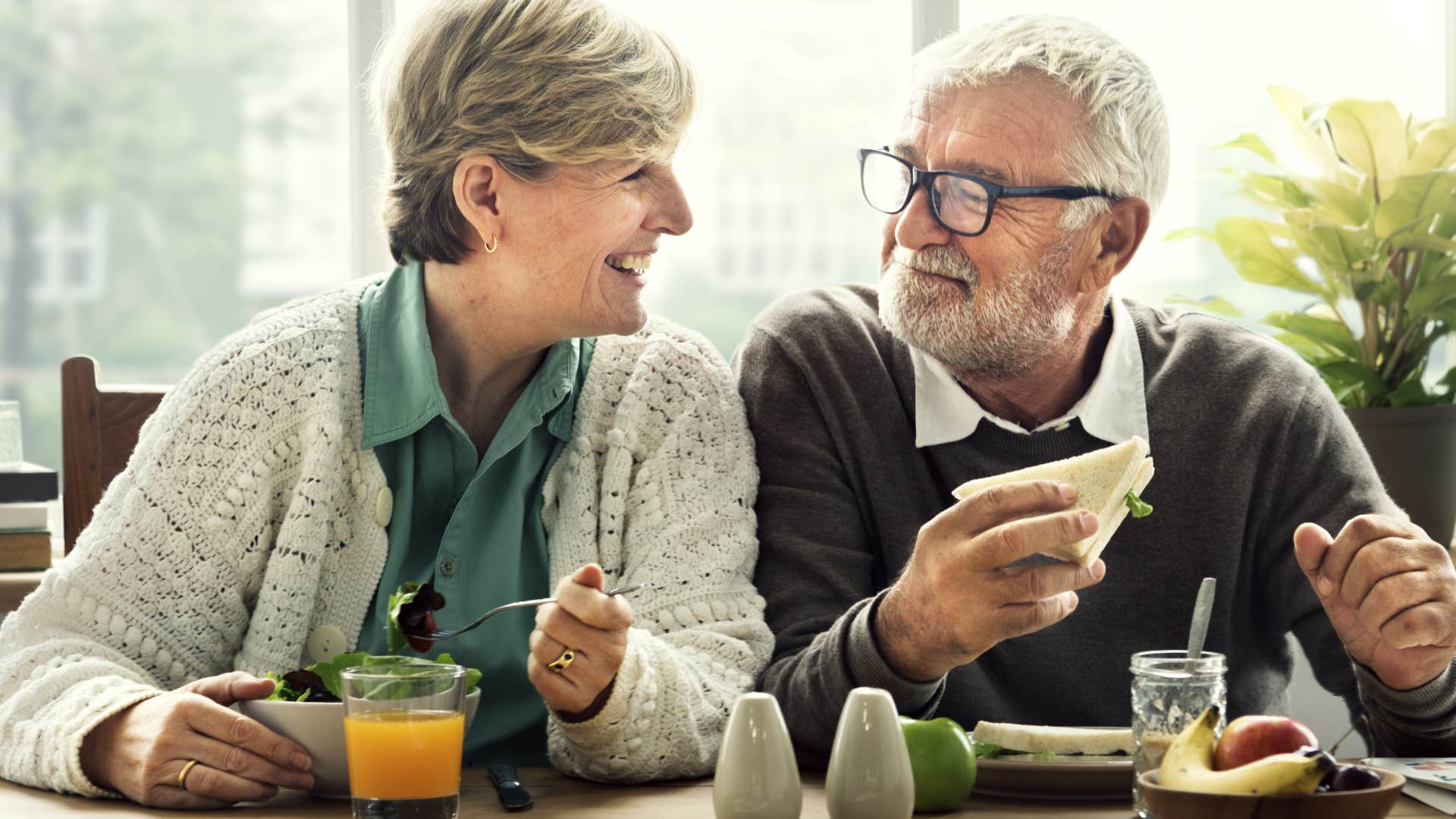 Man who's flexible to their partner's needs eating.