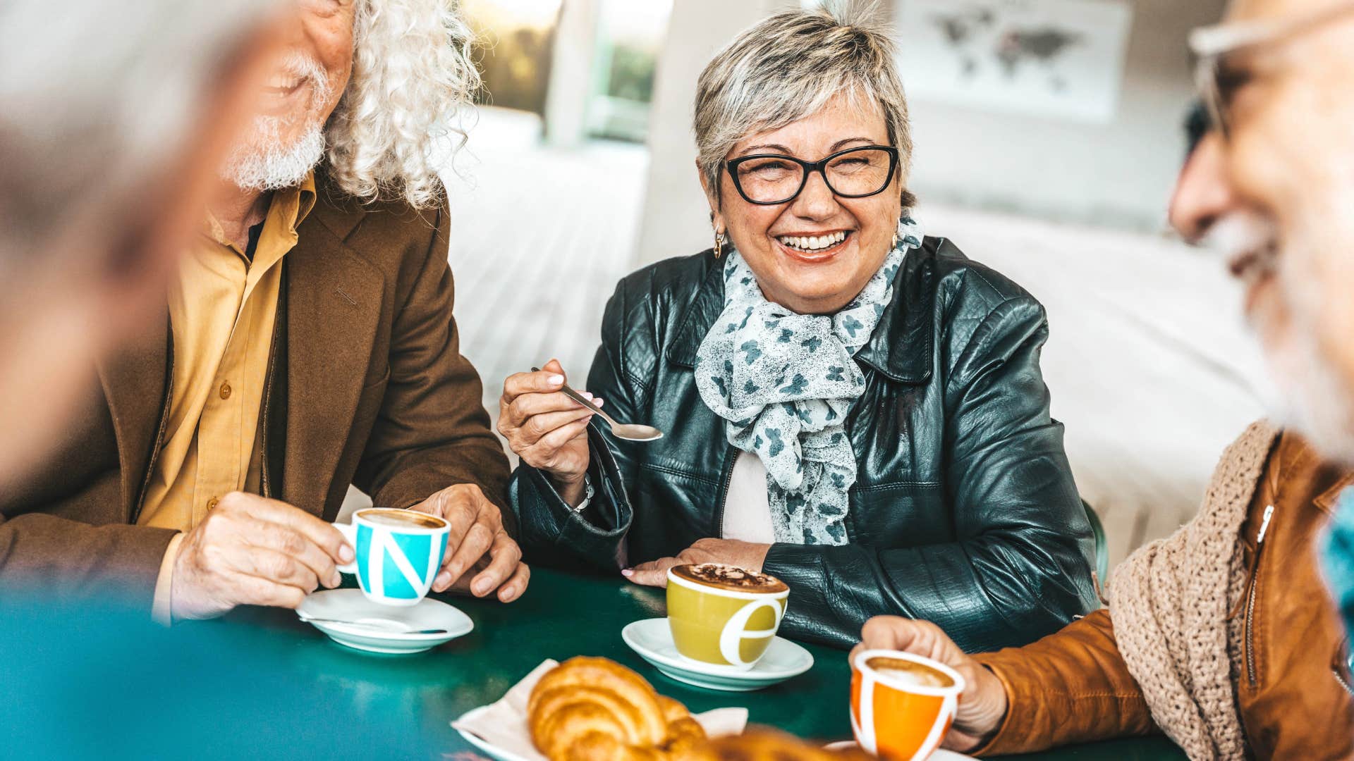 Couple who keeps their commitments smiling at dinner.