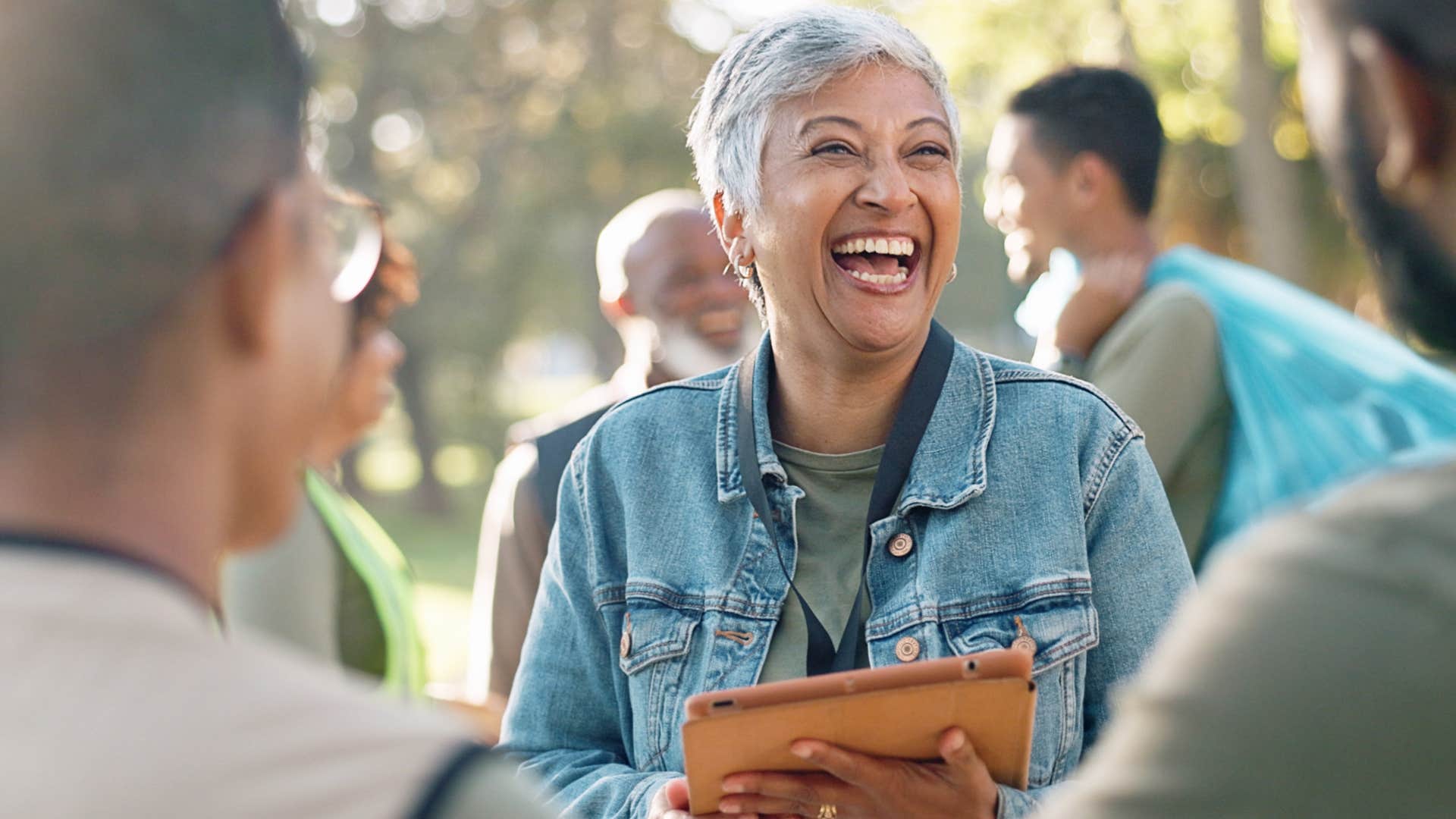 woman adjusting her behavior to match people smiling