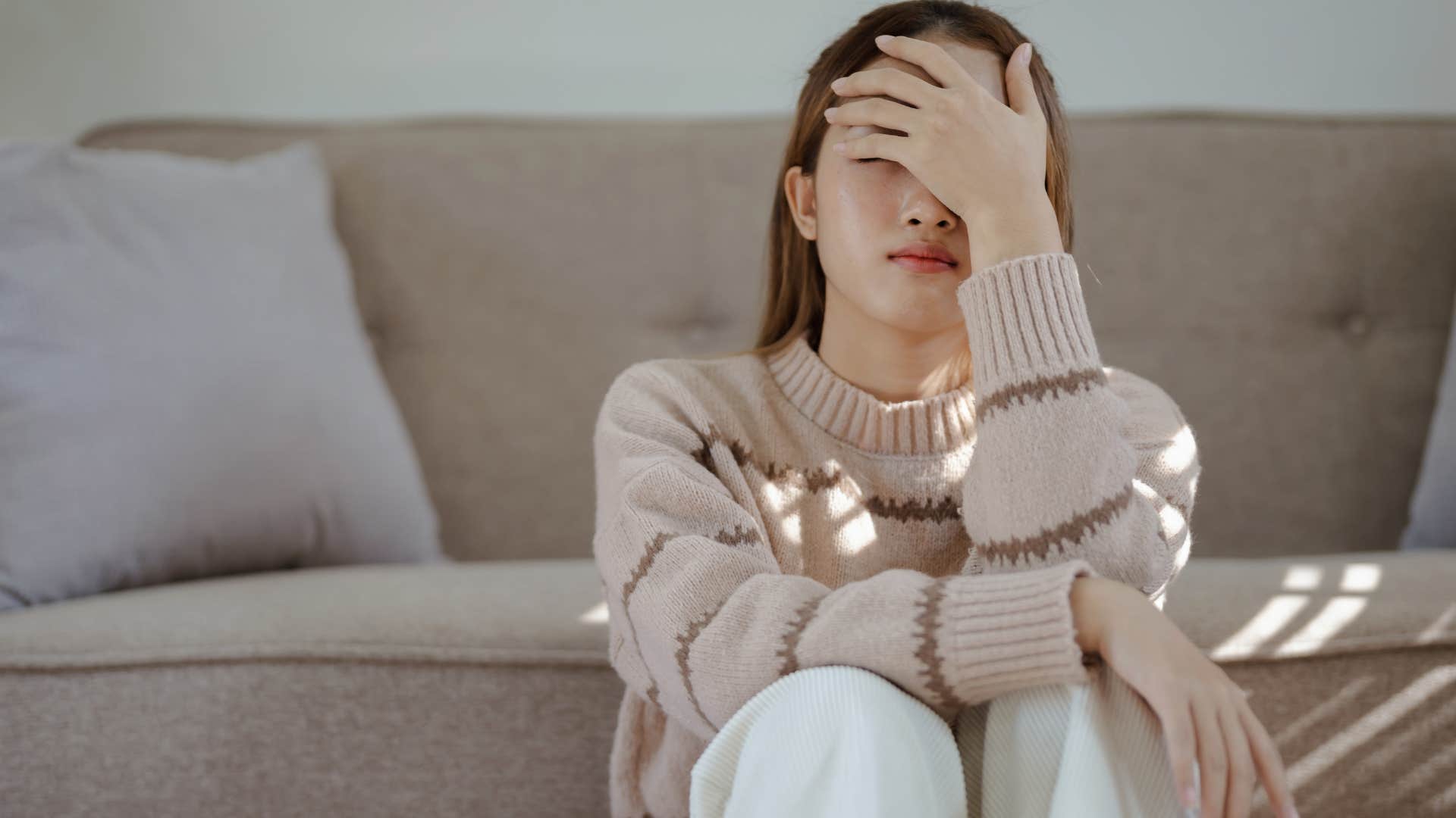 woman feeling drained after group social event