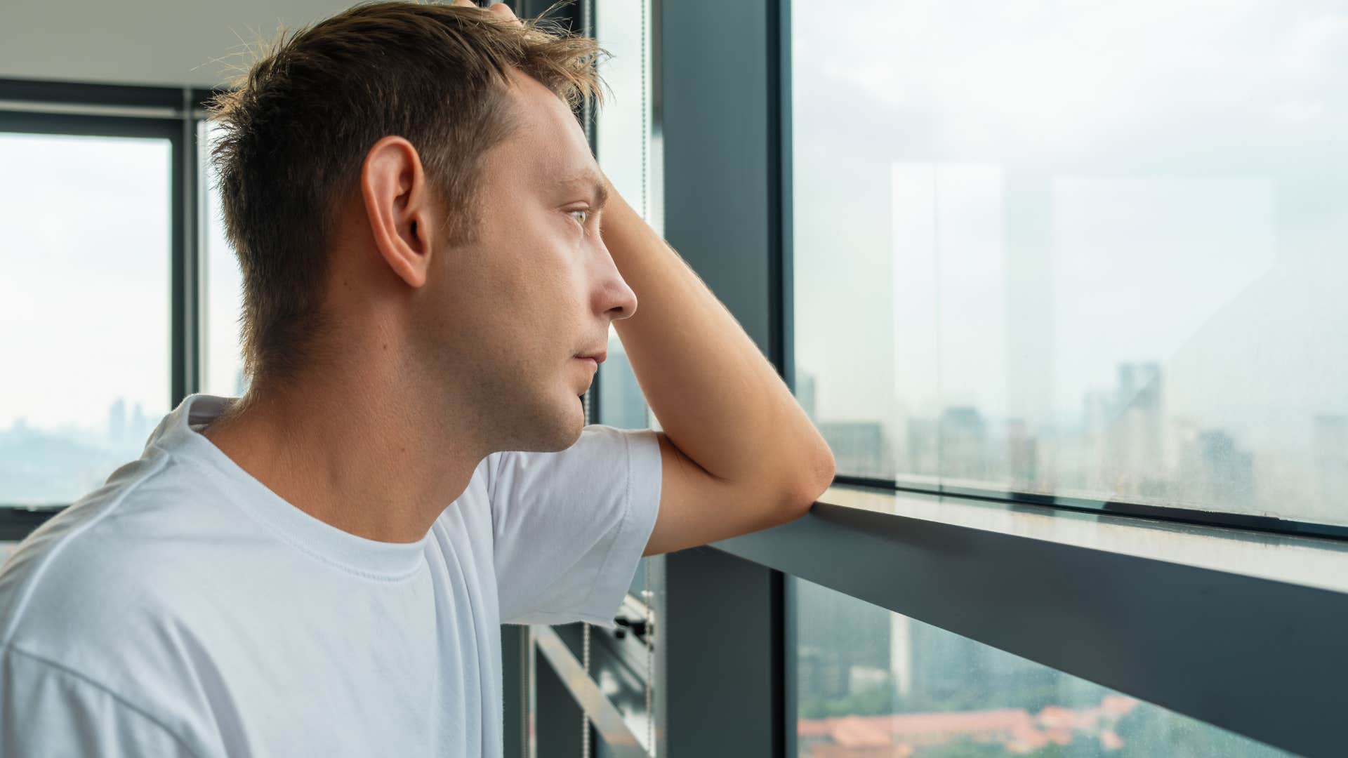man feeling deeply affected by his environment