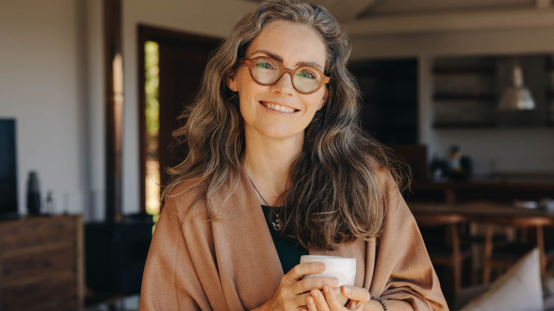 calm woman who finds healing in somatic practices