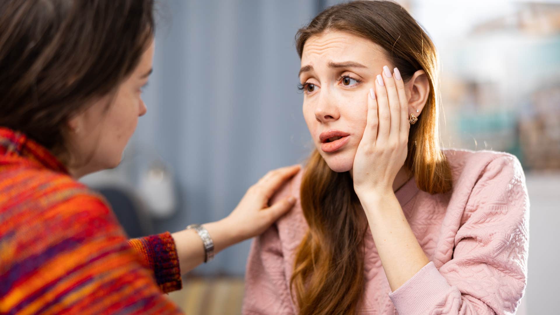 empathic woman physically feeling emotions of friend