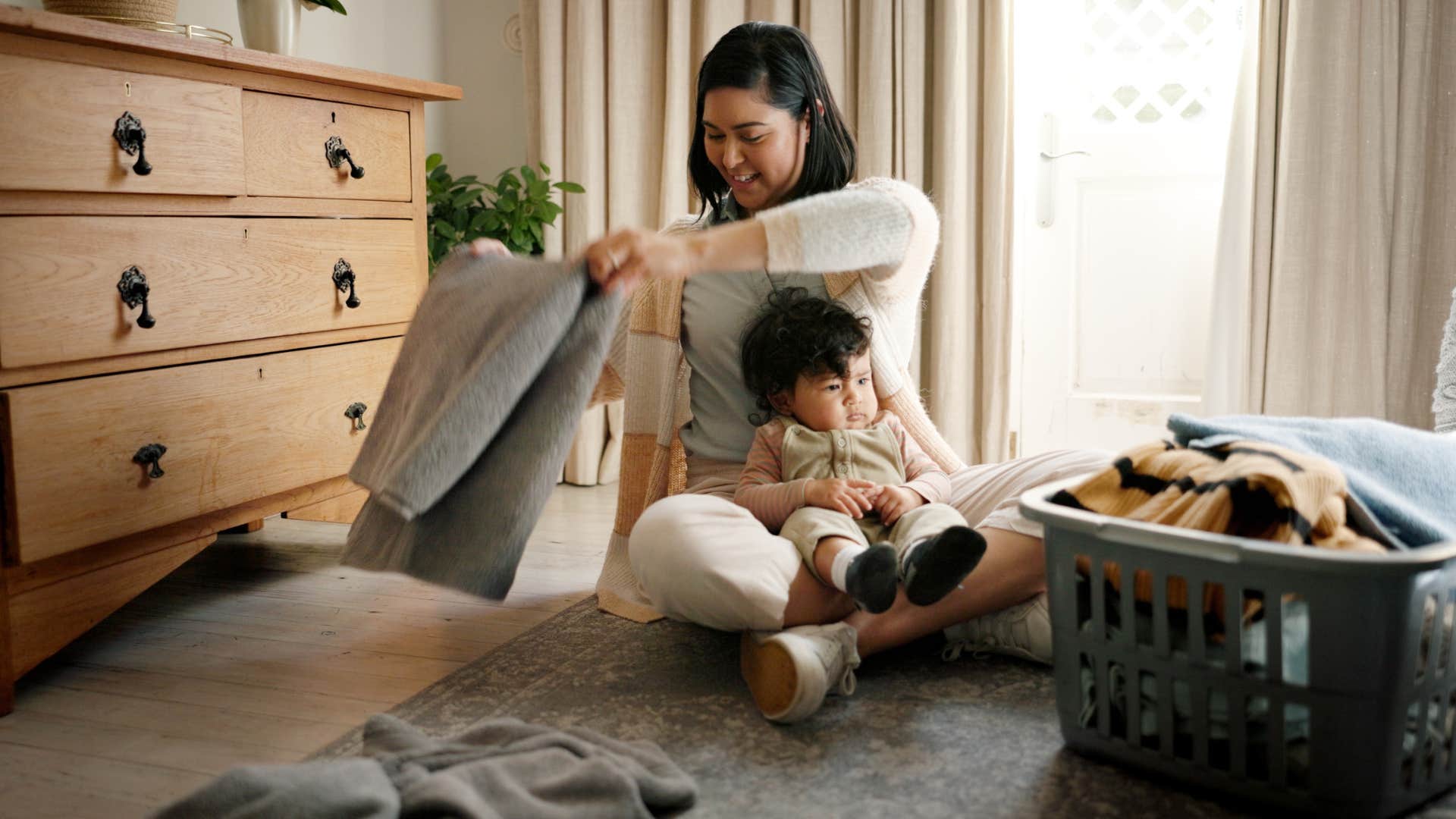 woman having a clean house even though it doesn't make her a good mom