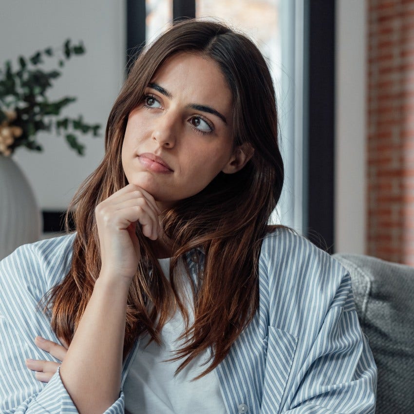 woman who is naturally authentic as she wonders if there is something affecting her emotionally