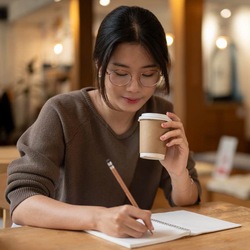 woman who live a happy peaceful life as she makes a list of values