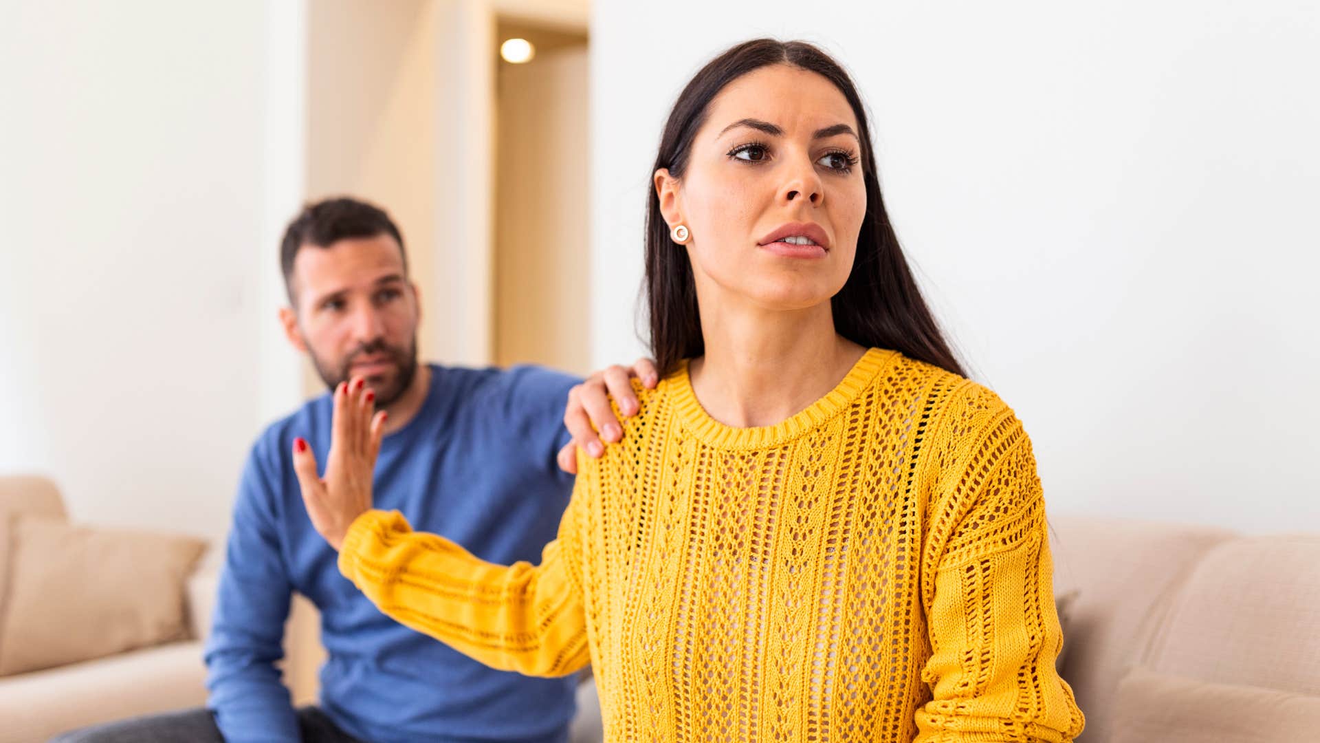 narcissistic woman ignoring mans boundaries putting hand up