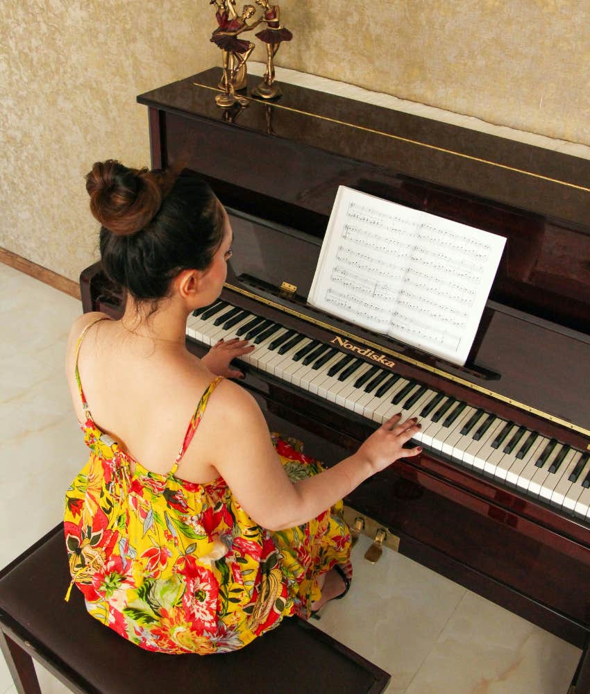 woman playing piano personal growth